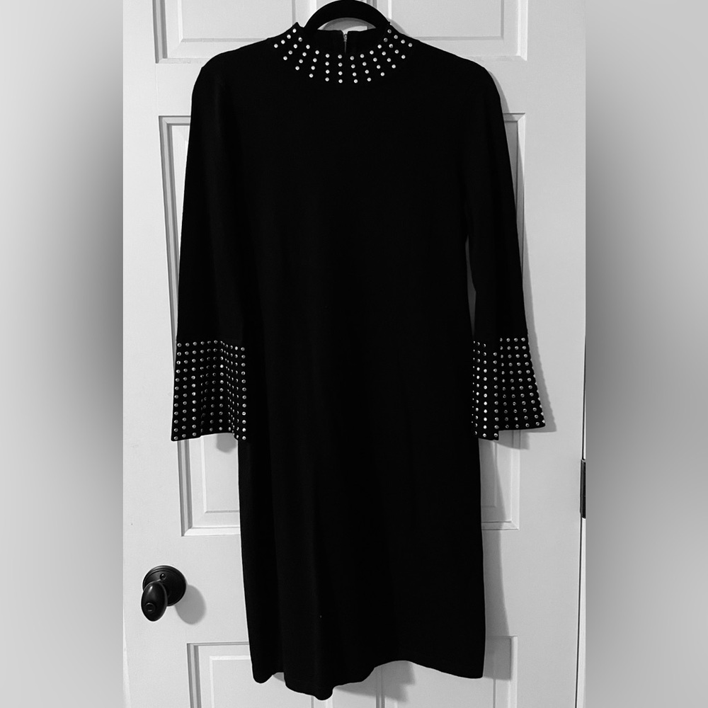 Calvin Klein black sweater dress. Gold studs. Mock turtleneck. Flare sleeves. 8